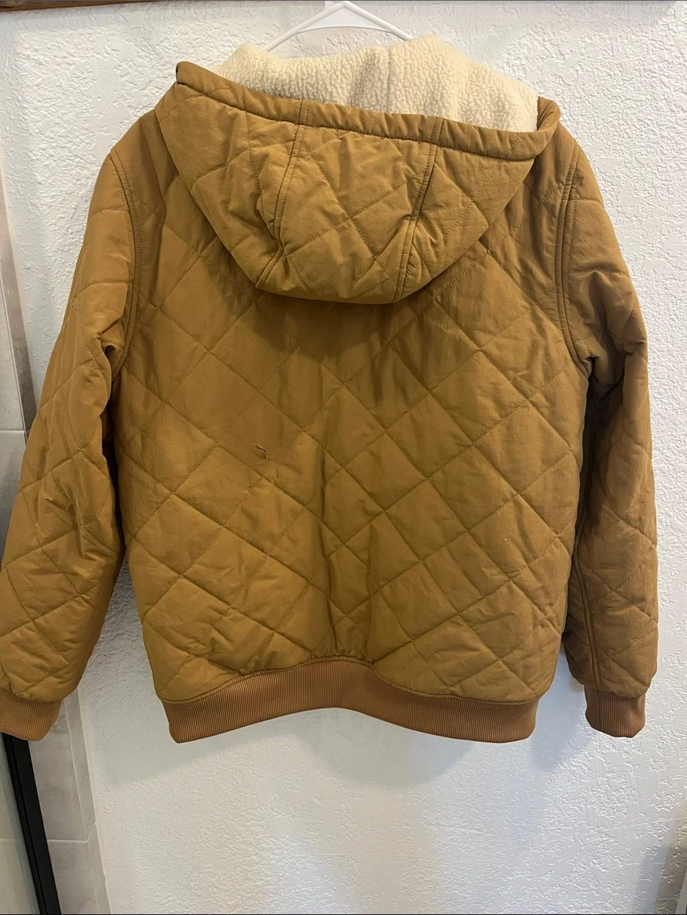 The North Face Quilted Sherpa-Lined Jacket in Camel